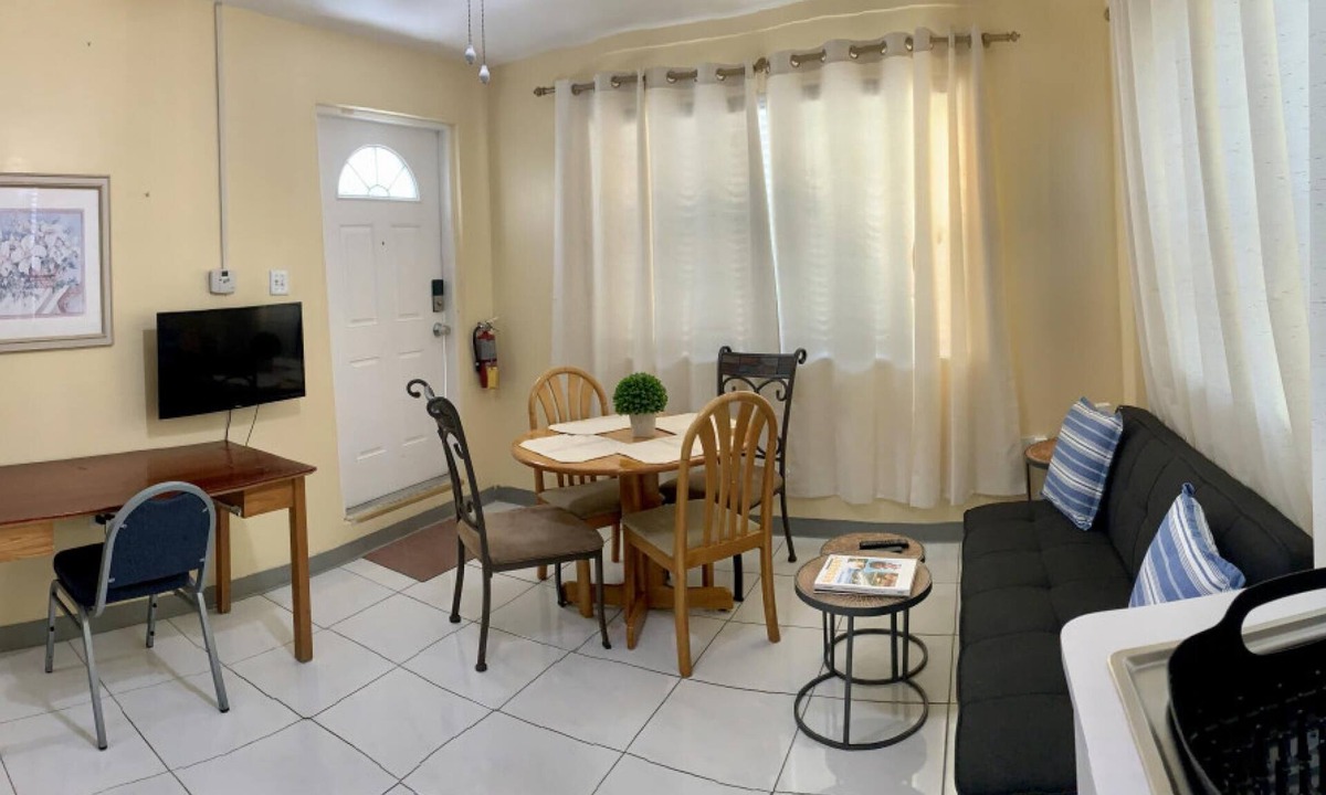 West Bay Apartment | 3-suite Group Stay Steps to Beach Sleeps 13