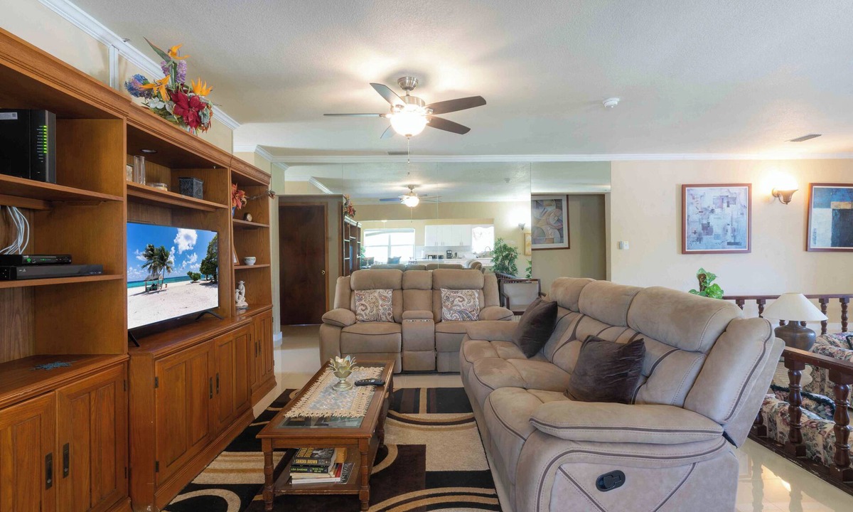 Northwest Point House | Delightful 3-bedroom house with AC in West Bay. Walkable to the public beach.