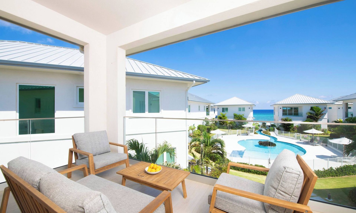 Northwest Point House | Oceans 9: Seaside Lazy River Pool, Sunken BBQ Ocean Lounge + Designer Interiors in West Bay
