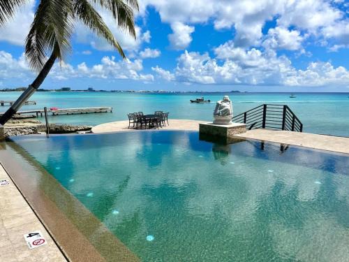 Northwest Point House | Seven Mile View #1 - 2 BR Oceanfront Condo & Pool