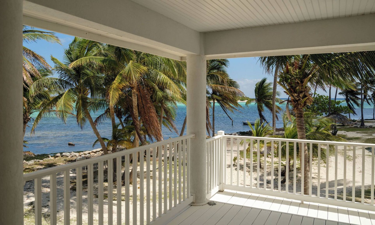 Blossom Village Villa | Sonny's Place - Beachfront Two-Bedroom Villa- Wake up to the sound of the waves