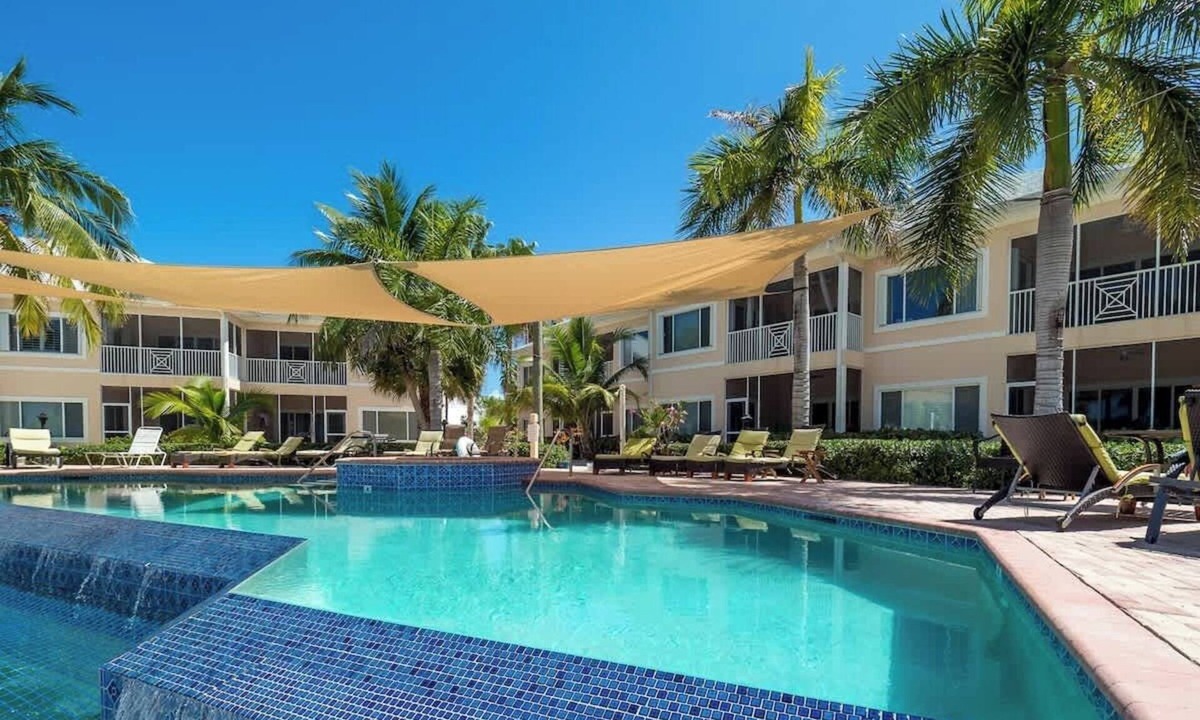 Rum Point Condo | Waterfront Colonial Kai 2BR - Pool, Kayak & SUP