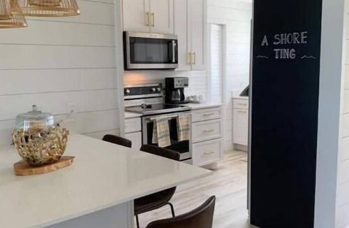 Blossom Village Condo | "A Shore Ting" NEW to market! Exclusive serenity.come and experience it!