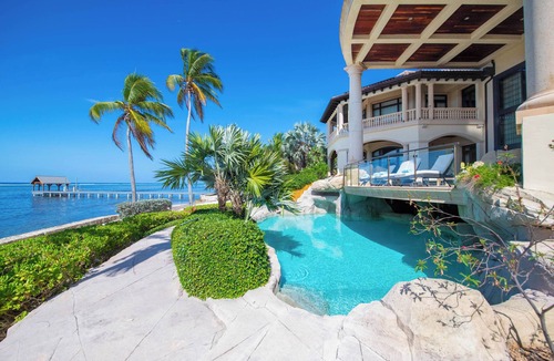 South Sound House | Castillo Caribe: Ultra-Luxe Estate w/Pool Grotto, Tennis & Pickle Ball Courts + Home Spa & Gym