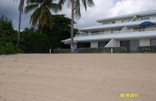 Seven Mile Beach Condo | Cayman Famous Seven Mile Beach Sunset Cove corner unit-RIGHT ON BEACH STEPS AWAY