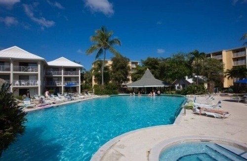 Seven Mile Beach Condo | Cayman Famous Seven Mile Beach Sunset Cove corner unit-RIGHT ON BEACH STEPS AWAY