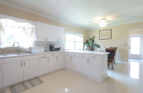 Northwest Point House | Delightful 3-bedroom house with AC in West Bay. Walkable to the public beach.