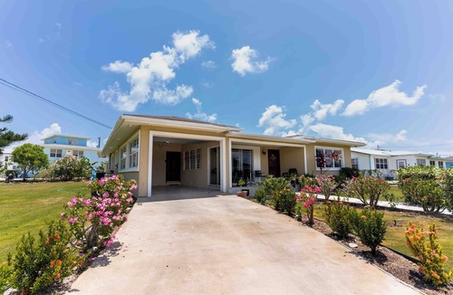 Northwest Point House | Delightful 3-bedroom house with AC in West Bay. Walkable to the public beach.