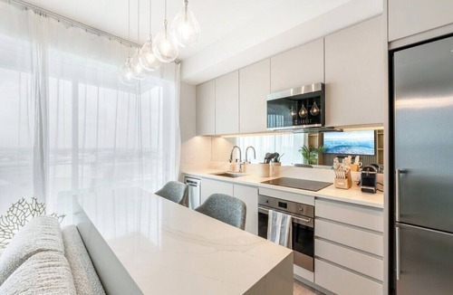 George Town Apartment | Luxury 1BR Residence at One GT · Rooftop Pool & Views