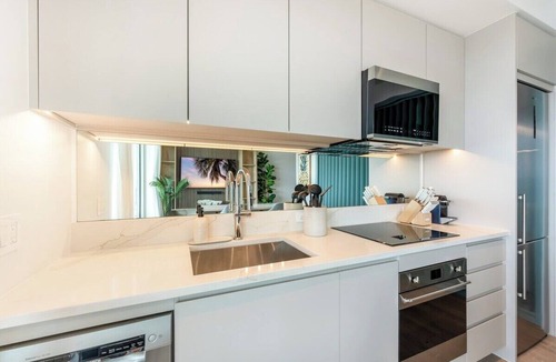 George Town Apartment | Luxury 1BR Residence at One GT · Rooftop Pool & Views
