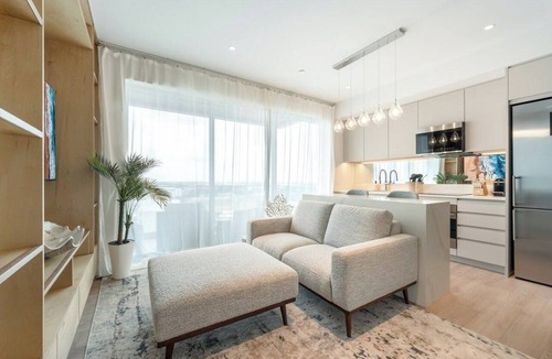 George Town Apartment | Luxury 1BR Residence at One GT · Rooftop Pool & Views