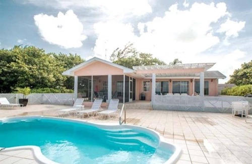 West Bay House | Oceanfront Oasis Villa with pool & cottage