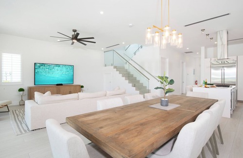 Northwest Point House | Oceans 9: Seaside Lazy River Pool, Sunken BBQ Ocean Lounge + Designer Interiors in West Bay