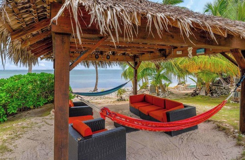 Breakers House | Piece of Mine Green: Beach Cottage on 200-feet of Shoreline w/Screened Porch, Snorkeling + Hammocks