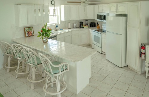 Blossom Village Villa | Sonny's Place - Beachfront Two-Bedroom Villa- Wake up to the sound of the waves