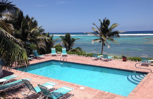 Bodden Town Apartment | Turtle Nest Inn, Ocean View Apt, Rental Car Included. Starting at 1199/week!