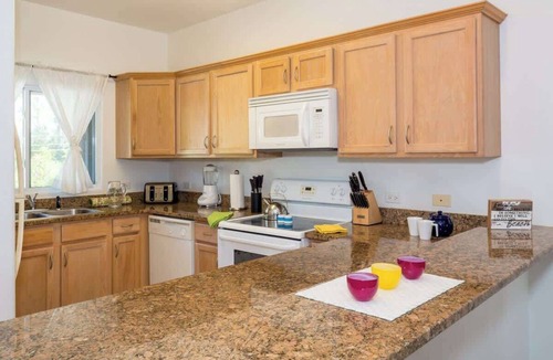 Rum Point Condo | Waterfront Colonial Kai 2BR - Pool, Kayak & SUP