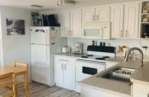 West End Condo | West End Cayman Brac Ocean front with pool at Carib Sands