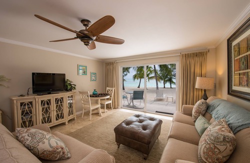 Seven Mile Beach Condo | White Sands 1-Beachfront Condo directly on 7 Mile Beach. Call Cayman Villas!