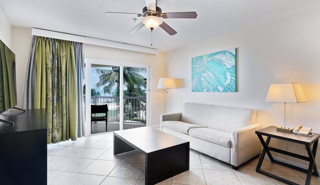 900 Sq Ft Pool View Suite Near Camana Bay with Poolside Dining & Beach Access in West Bay