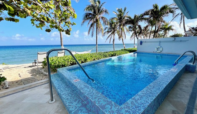 Beautiful 4-bed, 4-bath oceanfront home with a private pool and beach