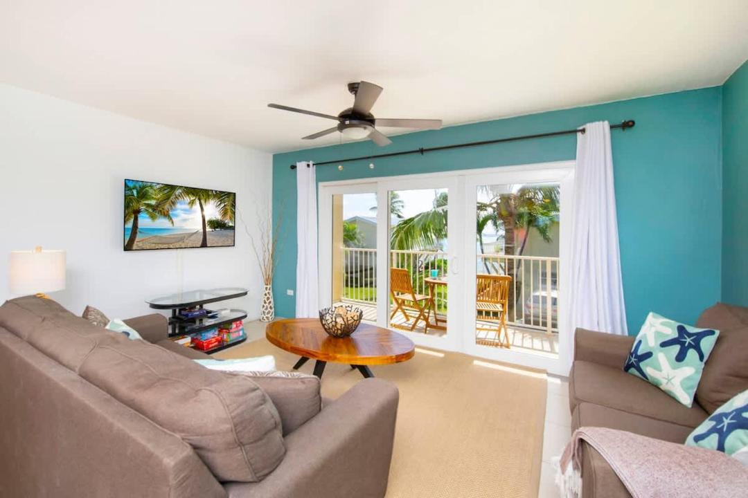South Sound House | Caribbean Paradise #29 - South Sound Oceanfront 2BR Condo with Pool