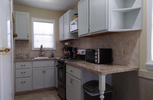Bodden Town House | Castaway by the Sea - "Private" Beach Bungalow