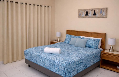 West Bay Apartment | 3-suite Group Stay Steps to Beach Sleeps 13