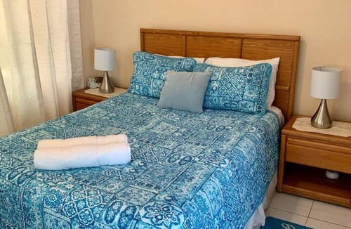 West Bay Apartment | S4 BP Steps to Beach Entire Apartment