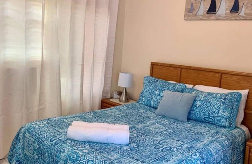 West Bay Apartment | S4 BP Steps to Beach Entire Apartment
