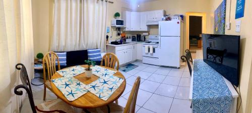 West Bay Apartment | SUITE 1, BLUE PAVILION - Steps to BEACH - NEW AC