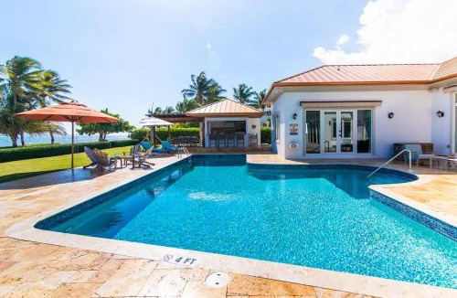 South Sound House | Faroway Luxury Ocean & Beach Villa - South Sound 4BR Oceanfront Estate